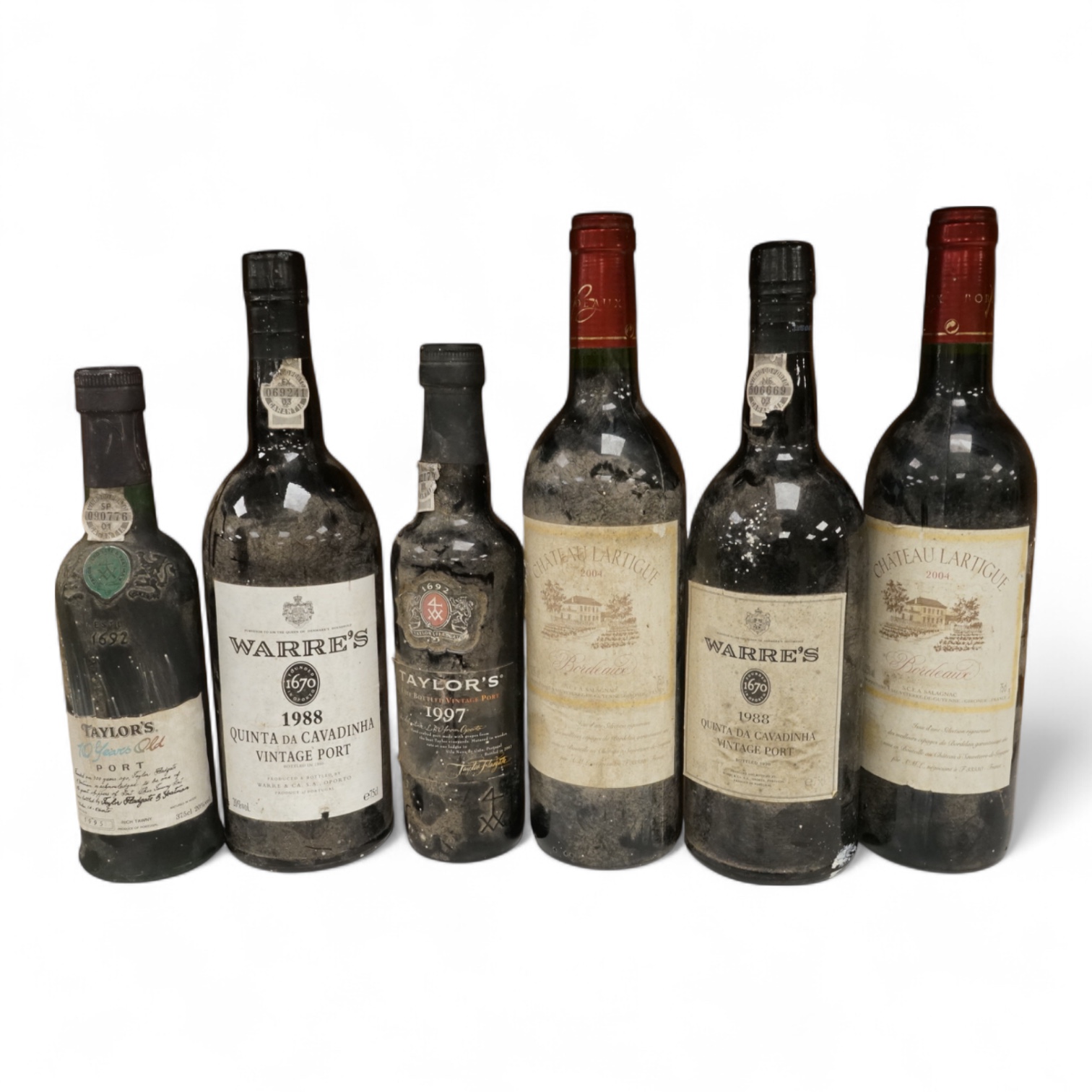 Two bottles of Warres 1988 vintage Port, a half bottle of Taylor's 1997, a Taylor's 10 year old Port, and two bottles of Chateau Lartigue, 2004